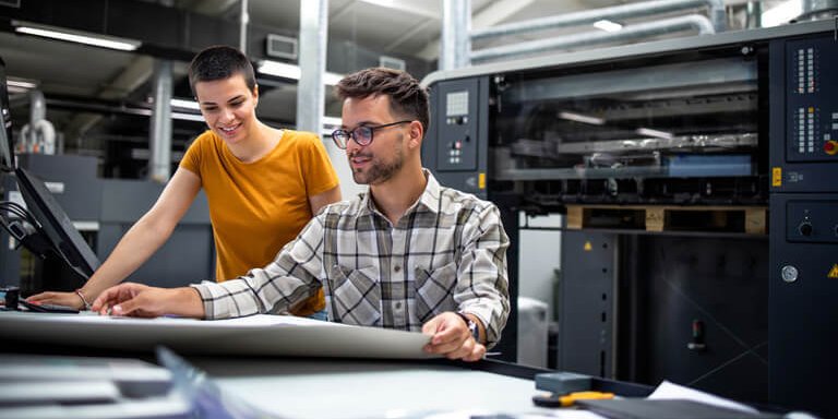 coworkers working on project together