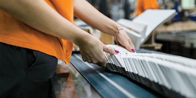 A person organizing papers