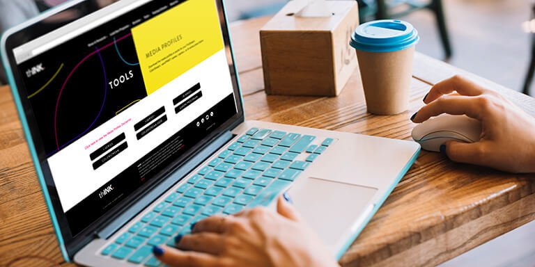 laptop with thINK site showing on the screen
